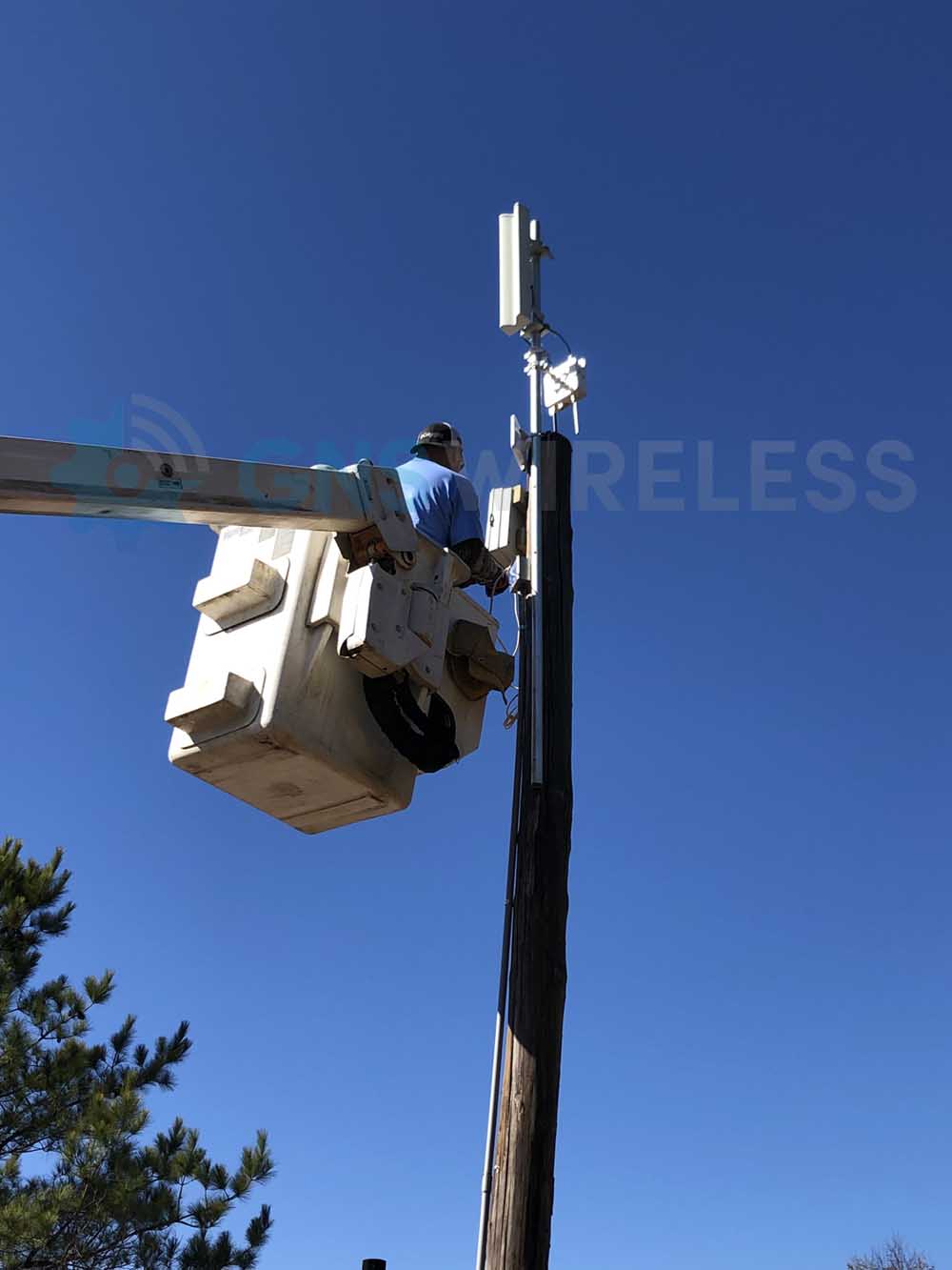 Using a boom lift for a recent Wi-Fi PTP Antenna Installation
